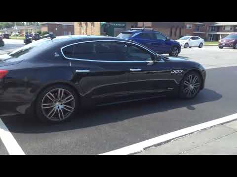 A 2017 Maserati Quattroporte Q4 GranSport is driving next to Christ Medical Center in Oak Lawn, IL.