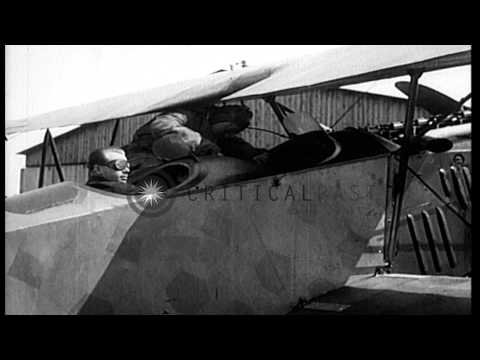 German World War 1 ace, Ernst Udet, gives passengers rides in a German Fokker D.V...HD Stock Footage