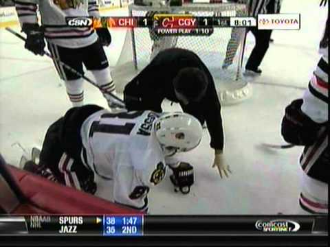 Mark Giordano crushes Marian Hossa