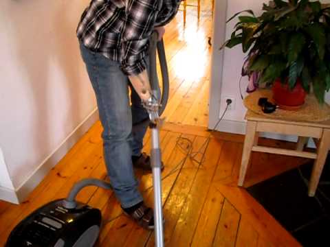 Dammsuga med armprotes