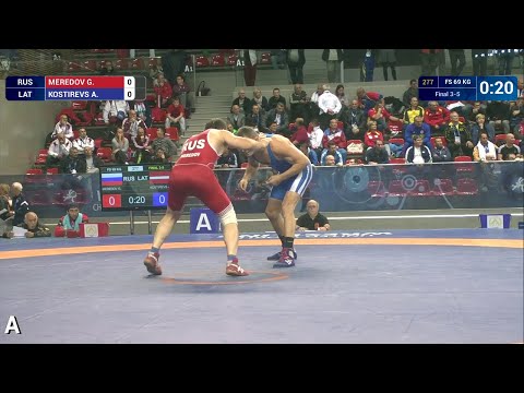 BRONZE FS - 69 kg: A. KOSTIREVS (LAT) df. G. MEREDOV (RUS) by TF, 10-0