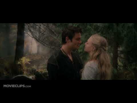 Trailer still of snowy rooftops and torches, matching the score’s cold drones and chimes