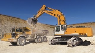 preview picture of video 'Liebherr R974C Excavator Loading Volvo A35C Dumpers With Hard Lime'