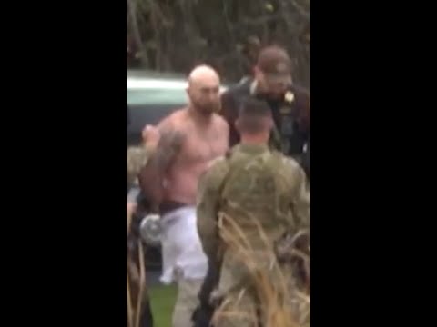 One escaped inmate captured while another is at large