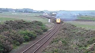 preview picture of video 'Deltic 55022 'Royal Scots Grey' Storms out of Brora...'