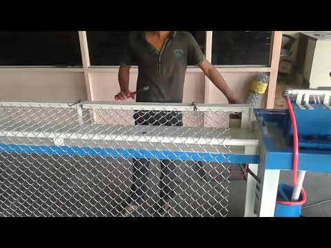Semi automatic chain link fence machine in action