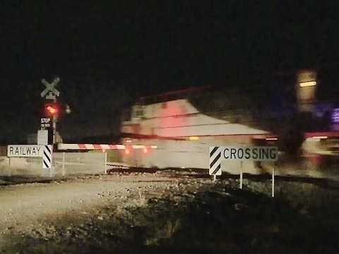Quad SCT locomotives at Night - Australian Freight Train at Level Crossing