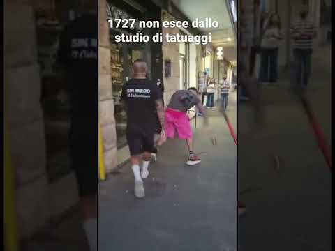1727 is attacked by street poet and Colombian Niko Pandetta outside the tattoo studio