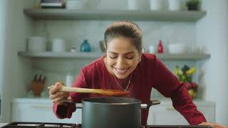 Shan Woman in red clothes in the Shan Foods commercial