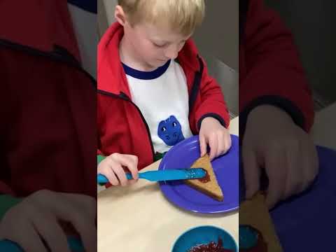 Children Preparing Sandwiches in Montessori classroom