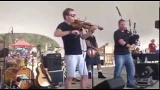 Fiddle player Victor Gagnon breaks a string and keeps playing