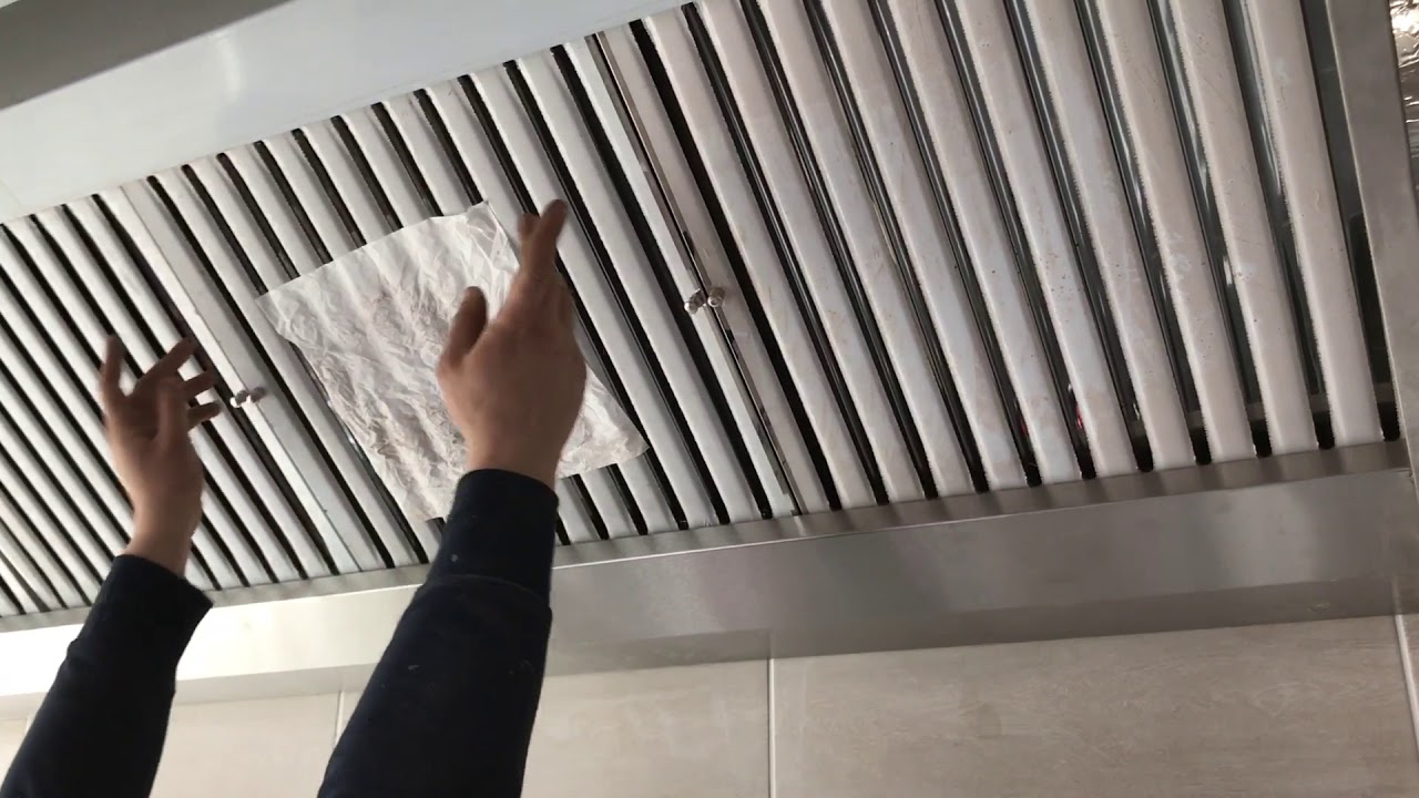 TEST D'ASPIRATION HOTTE DE CUISINE PROFESSIONNEL POUR DÉSENFUMAGE PAR CAISSON D'EXTRACTION