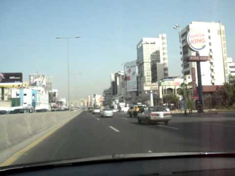 Driving in Zalka outside of Beirut. A guy runs in front of us on the highway.