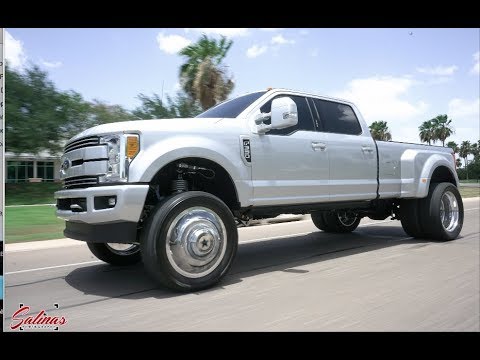 2017 F350 Dually on 24 inch American Forces and a 6 inch lift to clear 37s!