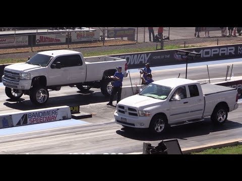 Monster Twin Turbo Duramax Diesel vs Stock Dodge Ram 1500 Drag Race