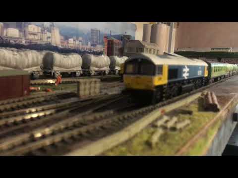 Model Railway: GBRf 66789 departs Blue Circle Cement with a Weed Killer Train