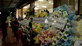 Thai gunman's mother apologizes at funeral