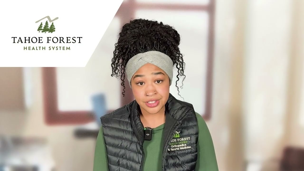 Jazlyn Richardson, Orthopedic Technician, standing in front of a blurred background with windows.