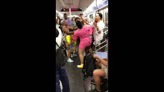 NYC Subway Fight between two women on uptown N train - August 25, 2018