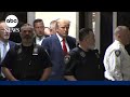 Trump enters courtroom to be arraigned