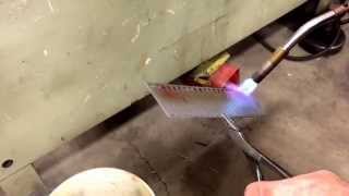 Heating and bending titanium. To make clips, but they still ended up cracking.