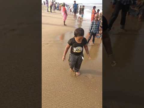 Pranitha papa enjoying #beach #waves #shorts #reels #cute #baby