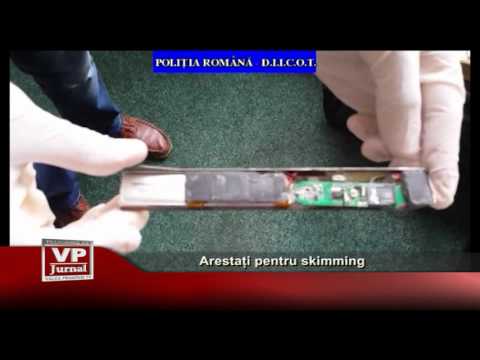 Arestati pentru skimming