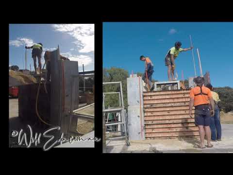 Building a Rammed Earth wall to support a Car Port Truss with door TIME LAPSE better sound