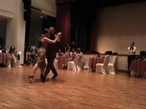  Andrea Misse  and  Javier Rodriguez  are  dancing  to  the  tango  "  En Esta Tarde Gris  "