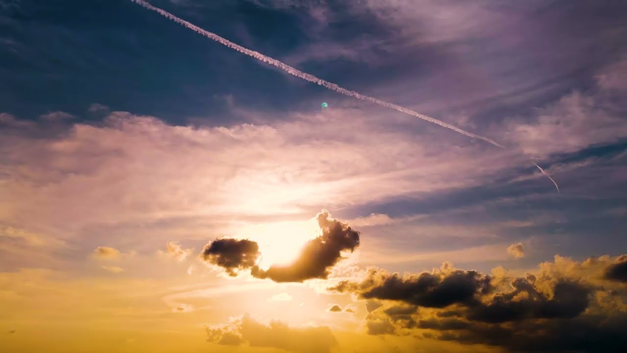 Dramatic Golden Hour Sunset On A Cloudy Day Timelapse Stock Footage (4K)