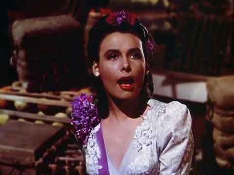 Vintage trailer art montage for Till the Clouds Roll By with Judy Garland billed among MGM stars, soundtrack focus