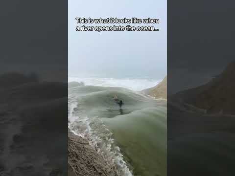 This is what happens when a river connects with the ocean 😳 #riverwave #ocean #beach #bigwaves