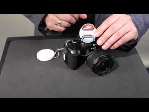 Kaiser Motiv-Objektivdeckel Smile Now mit Rastmechanik und Innengriff - by www.enjoyyourcamera.com