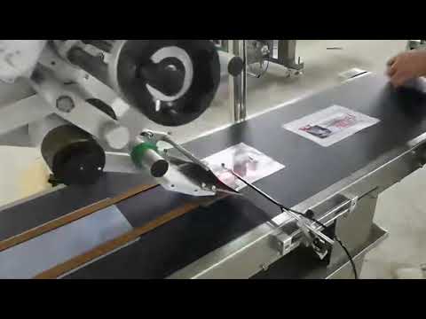 Automatic flat surface top labeling machine working video