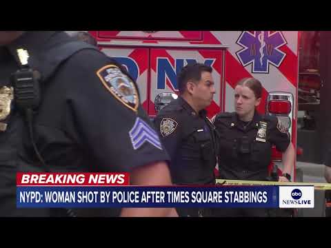 Woman shot by police after stabbing two people in Times Square