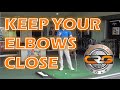 GOLF, KEEP YOUR ELBOWS CLOSER