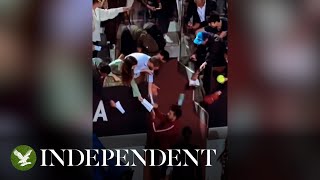 Novak Djokovic floored after being hit on head by fan’s drinks bottle at Italian Open