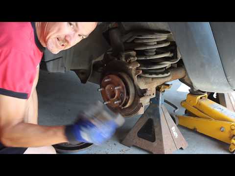 How to repair your Jeep Liberty's rear brakes. Dust shields.
