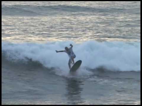 Longboarder ollies boogie boarder