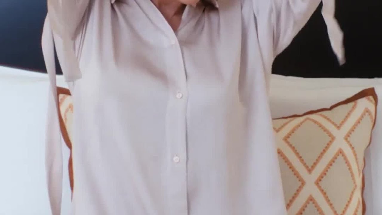 Pamela Anderson's Secret To A Perfect '90s Updo