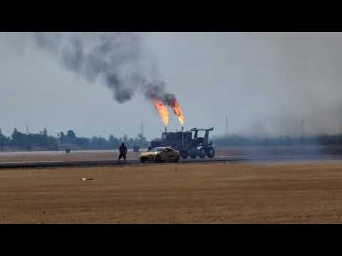 Shockwave Jet Truck versus Red Bull plane flying upside down 350 mph