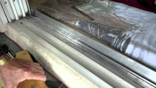 Home Repairs - 8 ft sliding door track repair