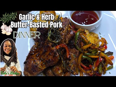 Garlic Herb Butter-Basted Pork , Cheesy Cajun Smashed Potatoes & Roasted Bell Peppers.