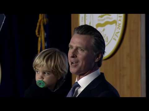 Governor's Sleepy Son Steals Spotlight at Inauguration Speech (edit)