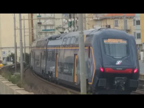 E464 669 Mazinga + etr521 089 Rock,passaggio di un treno regionale veloce e di un reg a Lavagna