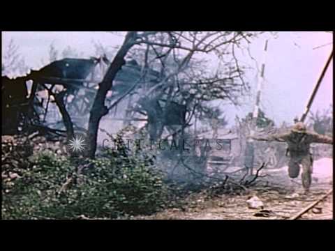 US Marines advance as tanks fire flamethrowers in Saipan, Mariana Islands during ...HD Stock Footage