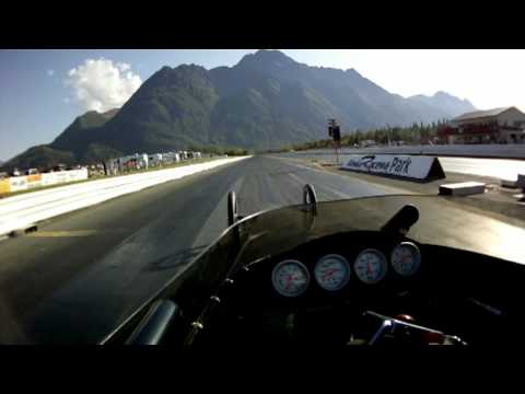 Mandi behind the wheel of an alcohol dragster