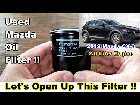 Mazda Oil Filter 1WPE-14-302 Oil filter Cut Open, Used Mazda Oil Filter