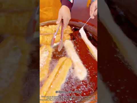 Crispy Golden Perfection: Traditional Fried Dough Sticks Made Fresh! 😋✨