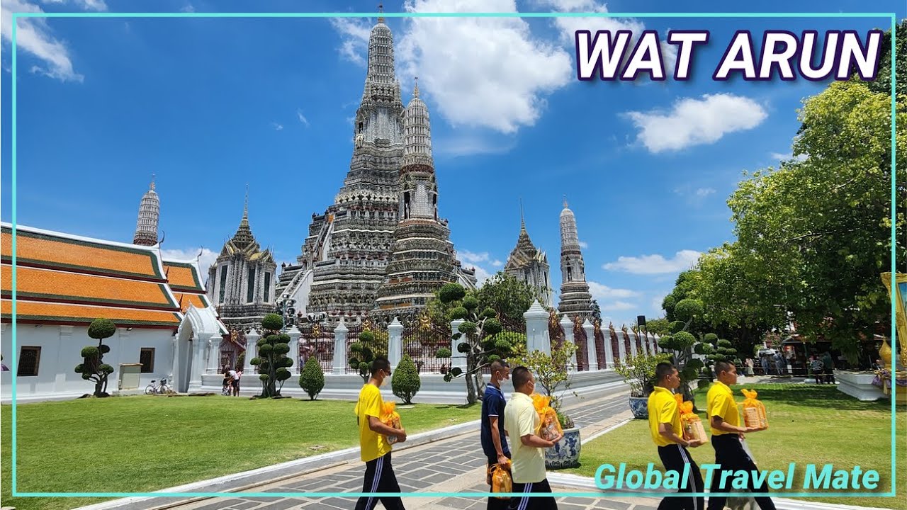 A traveler visits the majestic Wat Arun Temple in this video.